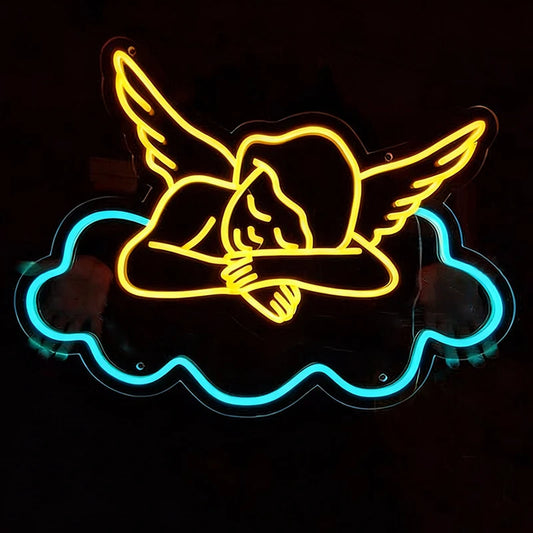 Neon sign of a lemon yellow angel with wings and an ice blue cloud, glowing against a dark background.