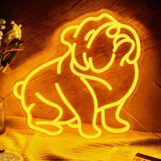 Neon bulldog light on a wooden surface with a warm glow