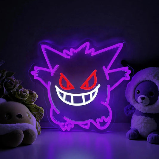 Neon light shaped like a gengar character with two plush toys on a dark background