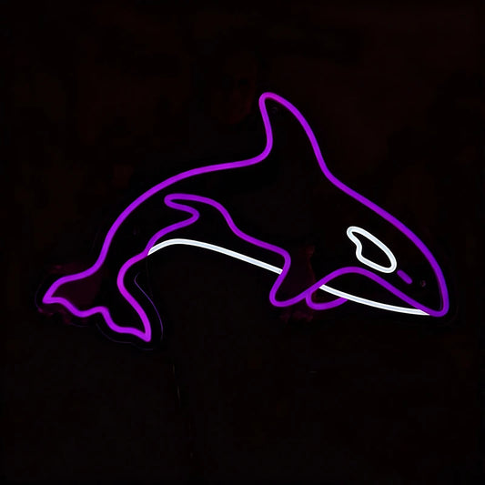 Neon sign with purple color of a shark on a black background