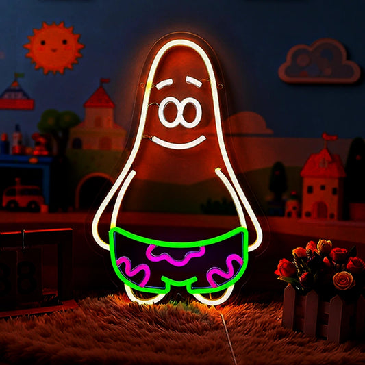 Neon sign shaped like a patrick star with a smiling face on a dark background with cartoon-style wall.