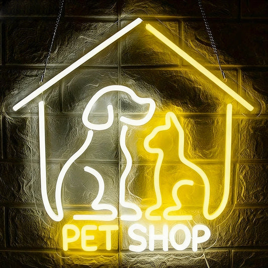 Neon sign of a dog and cat inside a pet house with 'Pet Shop' text on a dark background.