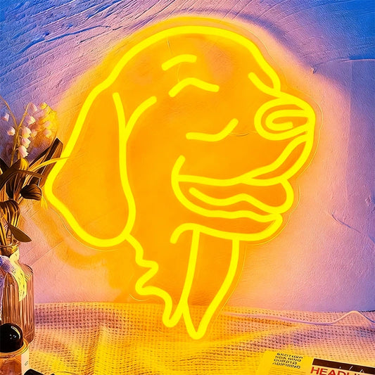Neon yellow dog outline on a textured wall with a plant and mesh fabric in the foreground.