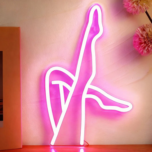 Neon sign of legs with a pink color.