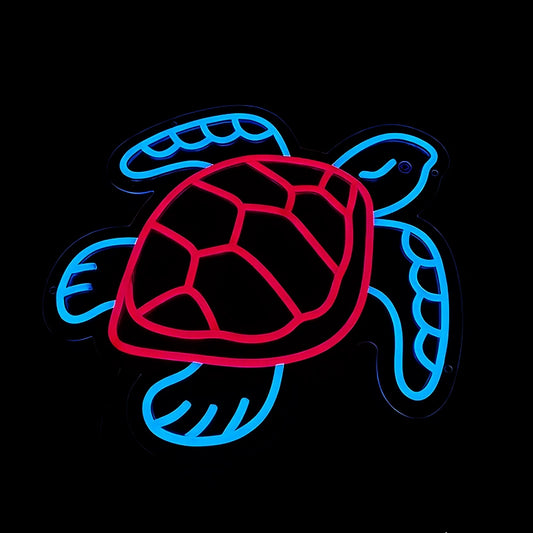 A neon-style sea turtle sign with a bright blue outline and a red shell, glowing against a black background.