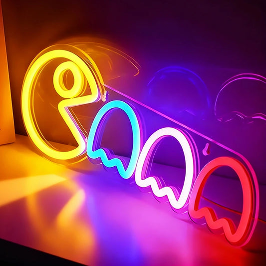 Neon sign shaped like a smiley face with colorful lights on a dark background