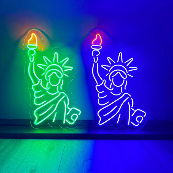 <img src='pic.jpg' alt='Statue of Liberty Neon Light.' />