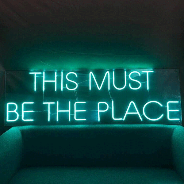 <img src='pic.png' alt=This Must Be the Place Wedding Quote Neon Sign1.' />