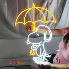 A neon sign featuring a cute anime-style character resembling Snoopy, holding an umbrella, illuminated in yellow color.