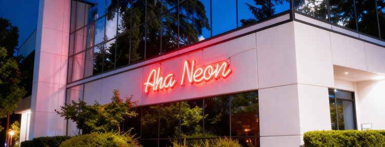 Neon sign on a building exterior with 'Aha Neon' branding.
