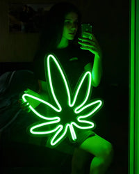 Woman with Green Leave Neon Sign