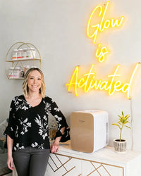 A yellow color neon sign with text "Glow is Activated"