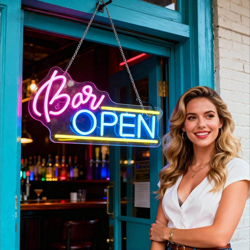 Woman standing in front of a bar with a neon 'Bar Open' sign