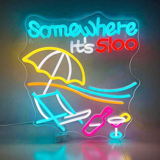 Neon sign with beach chair, umbrella, and cocktail, featuring the text 'Somewhere It's 500'.