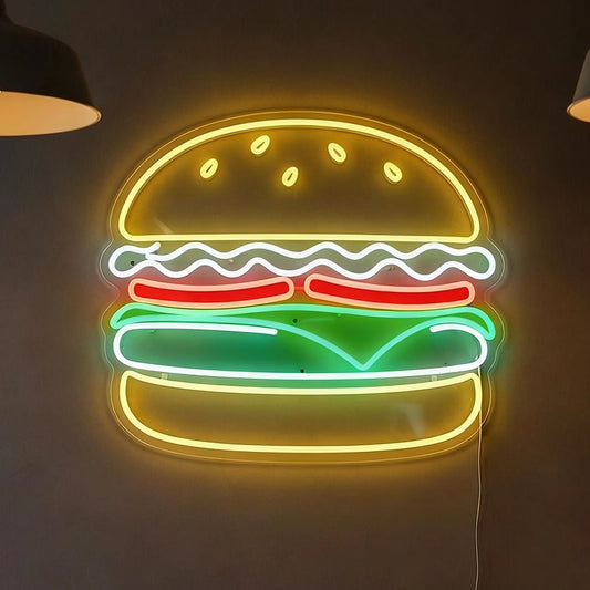 Neon sign shaped like a hamburger on a dark background
