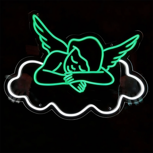 Neon sign of an angel on a cloud with green and white colors against a black background.