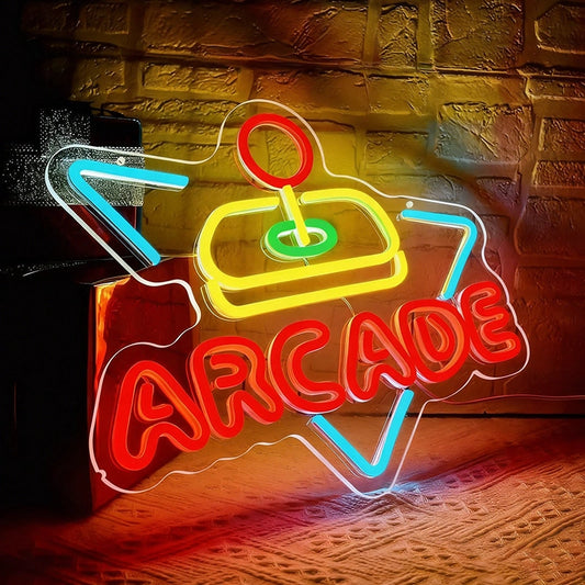 Neon sign with 'ARCADE' and game controller design on a brick wall background
