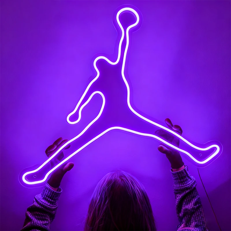 Neon Jordan logo on a purple background