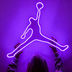 Neon Jordan logo on a purple background