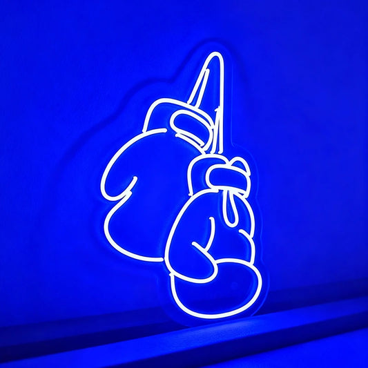 Neon sign of blue boxing gloves on a dark background.