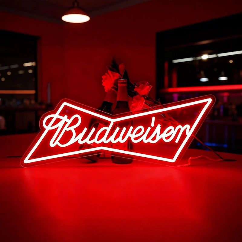 Neon Budweiser sign with red background