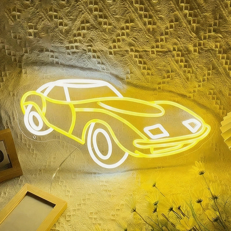 Neon light shaped like a car on a textured wall with decorative elements.