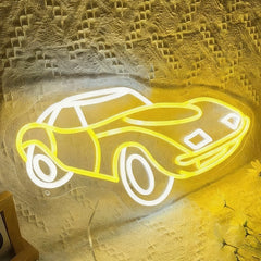 Neon with lemon yellow and white light shaped like a car on a textured wall with decorative elements.