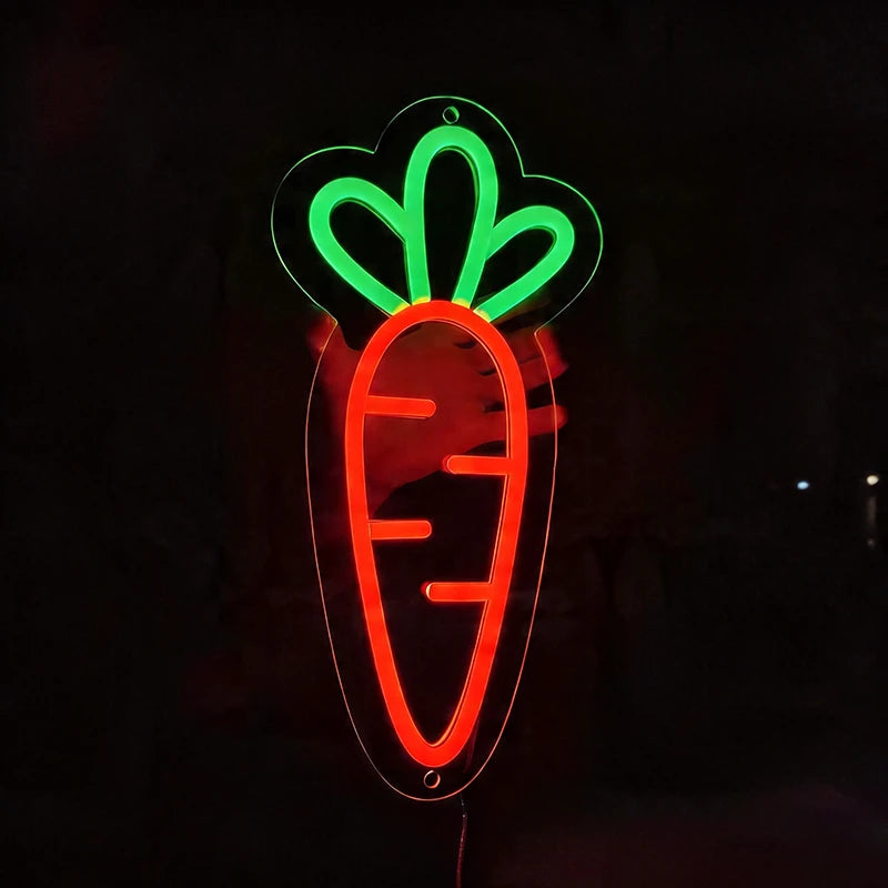 Neon sign of a carrot with a green top on a black background