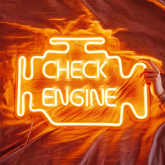 Warm white neon sign shaped like a car engine with 'Check Engine' text on a fabric background.