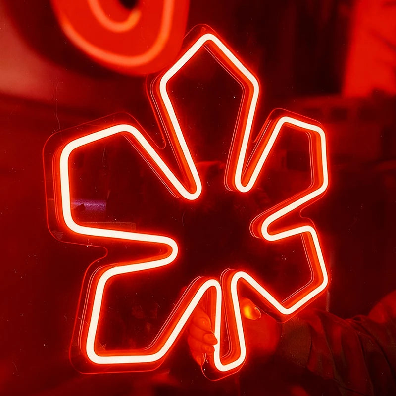 Neon red chestnut leaf on a dark background