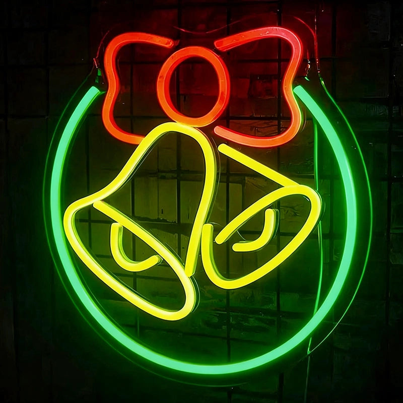 Neon sign with a bow and bell design on a dark background.