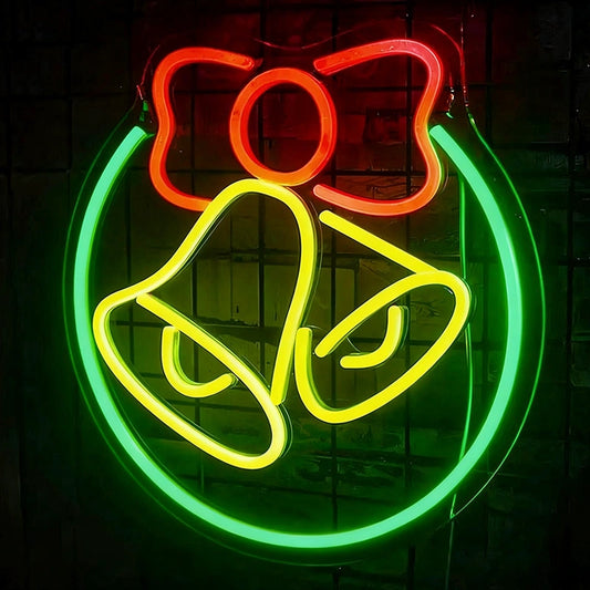 Neon sign with a bow and bell design on a dark background.