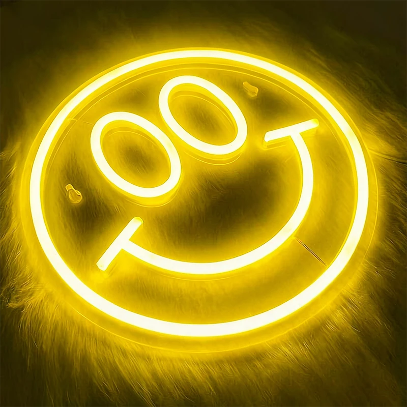 Neon classic smile face sign on a dark background