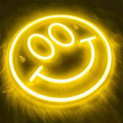 Neon classic smile face sign on a dark background