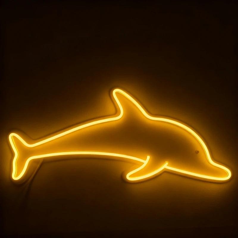Neon dolphin shape on a dark background