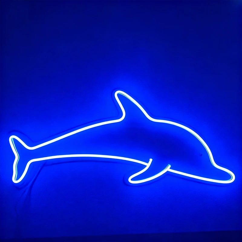 Neon dolphin shape on a blue background