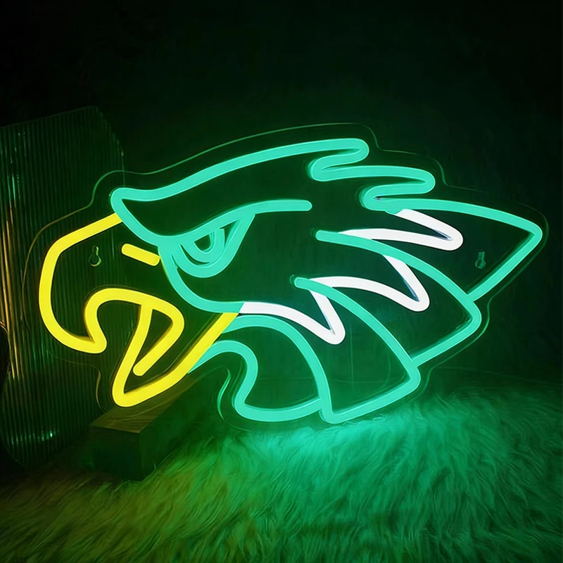 Neon sign of an eagle with lemon yellow, green and white colors on a dark background