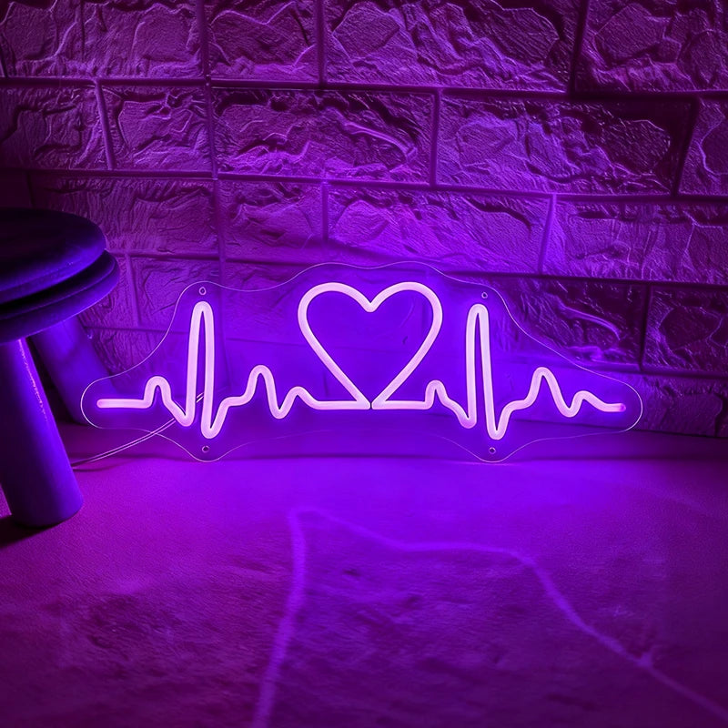 Neon with purple light shaped like a heart with an ECG line on a textured wall.
