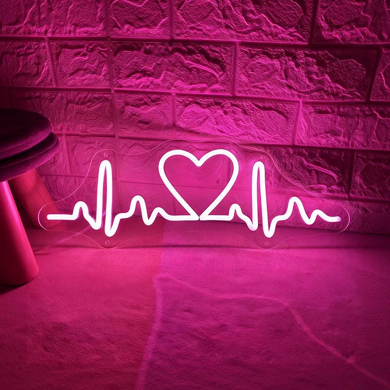 Neon with hot pink light shaped like a heart with an ECG line on a textured wall.
