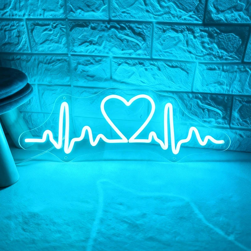 Neon with ice blue light shaped like a heart with an ECG line on a textured wall.