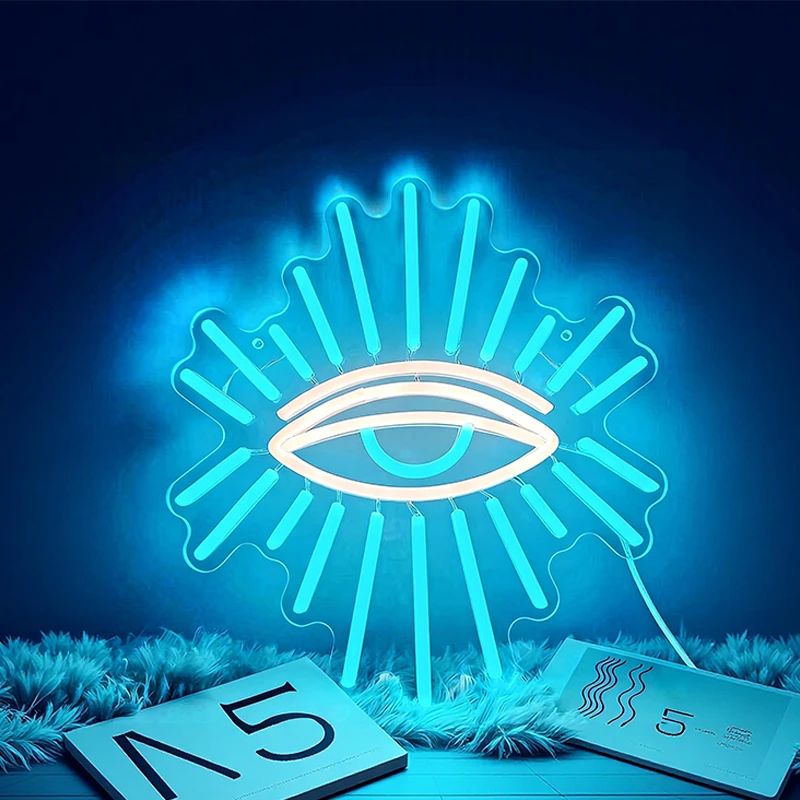 Neon light shaped like an eye with an ice blue glow on a dark background