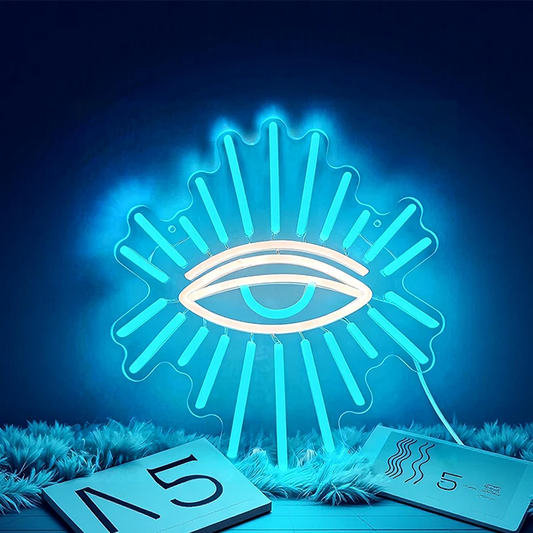 Neon light shaped like an eye with an ice blue glow on a dark background