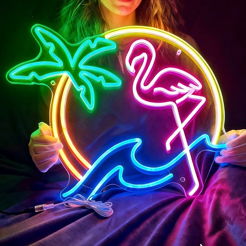 Neon sign with palm tree and flamingo design held by a person