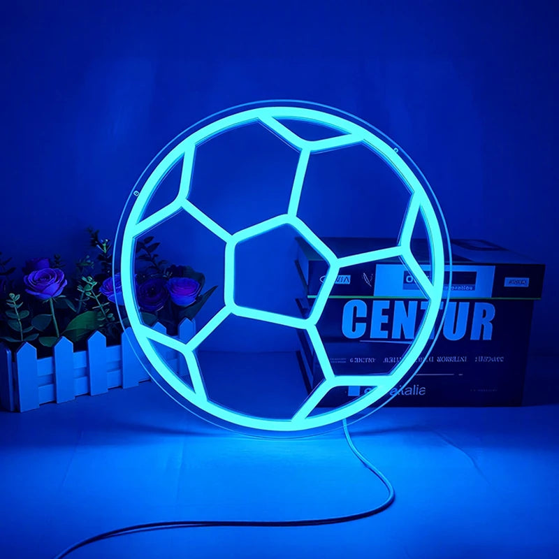 Neon light shaped like a soccer ball on a blue background