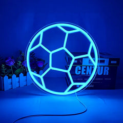 Neon light shaped like a soccer ball on a blue background