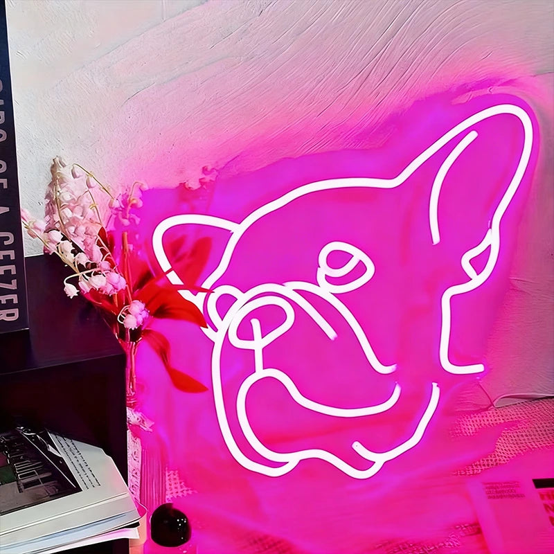 Neon light in a pink color shaped like a dog's face.