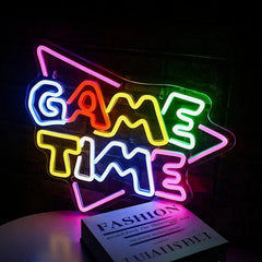 Neon sign with 'GAME TIME' on a dark background