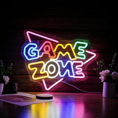 Neon sign that reads 'GAME ZONE' on a dark background