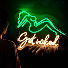 Neon sign with a woman's silhouette and 'Get naked' text on a dark background