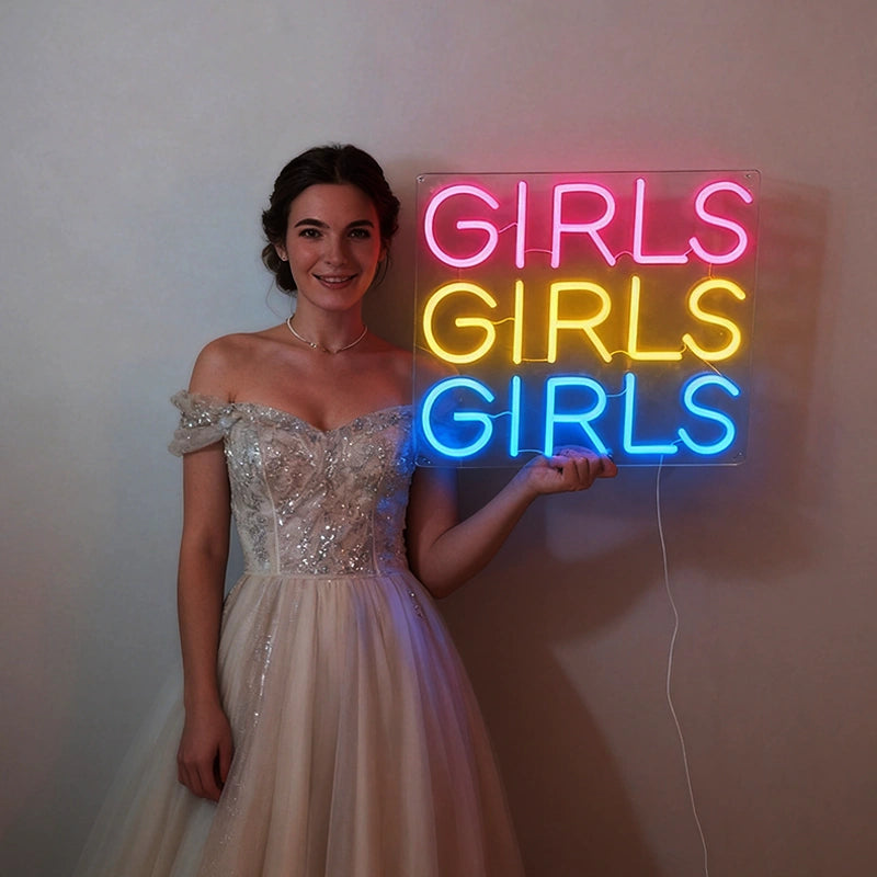 Woman in a white dress holding a neon sign with 'GIRLS GIRLS GIRLS' text.